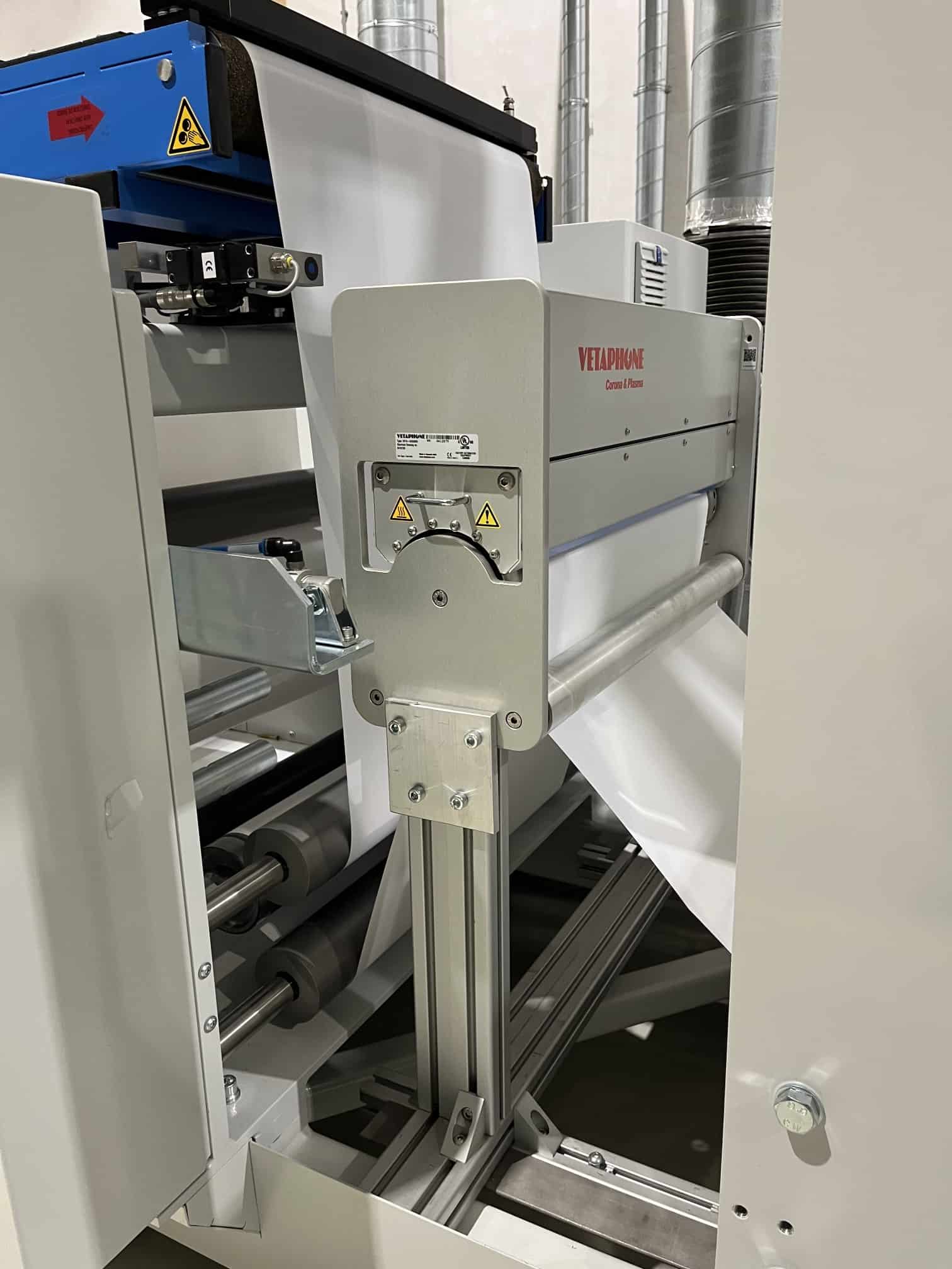 Vetaphone corona treater on a Maan Engineering linerless product line.